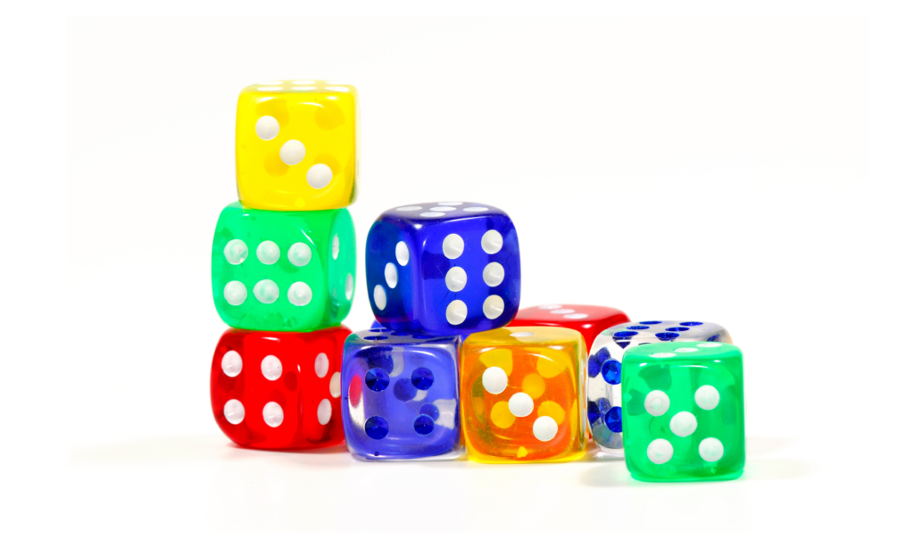 This image shows a photo of dice. Using simple materials like dice and hundreds charts to play classroom games will help students practice and master new content. 