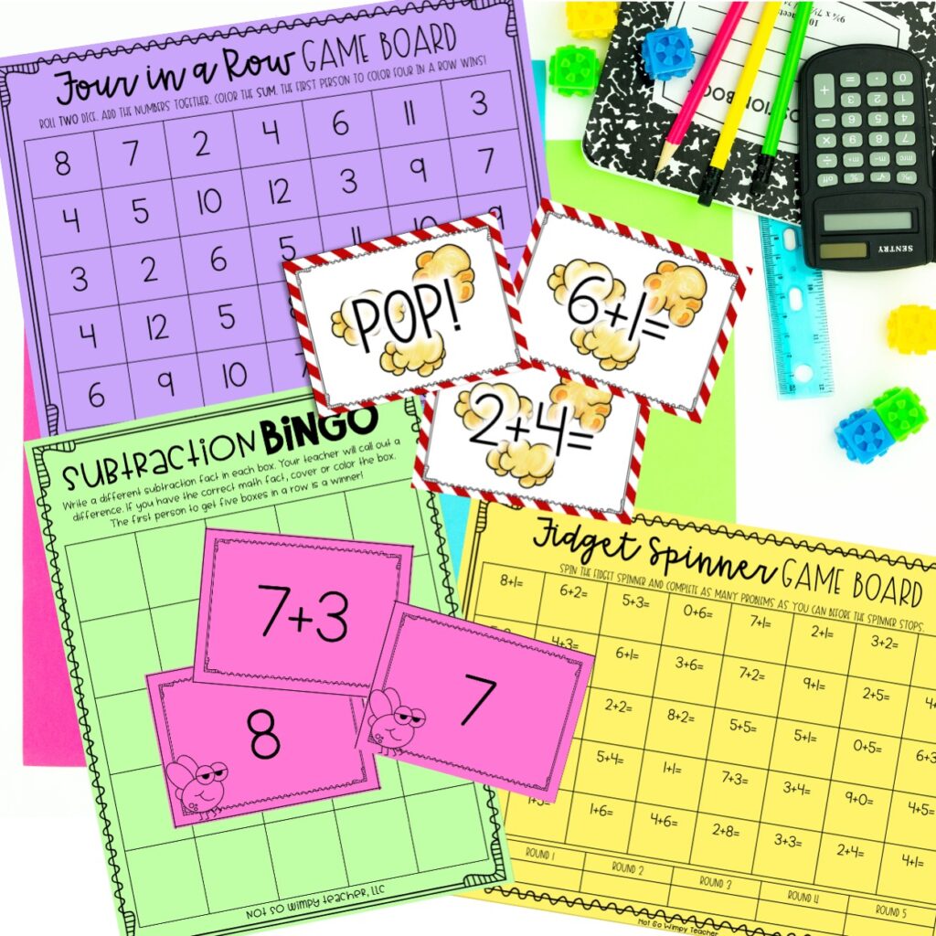 Math fact fluency games on brightly color4d paper with calculator and pencils