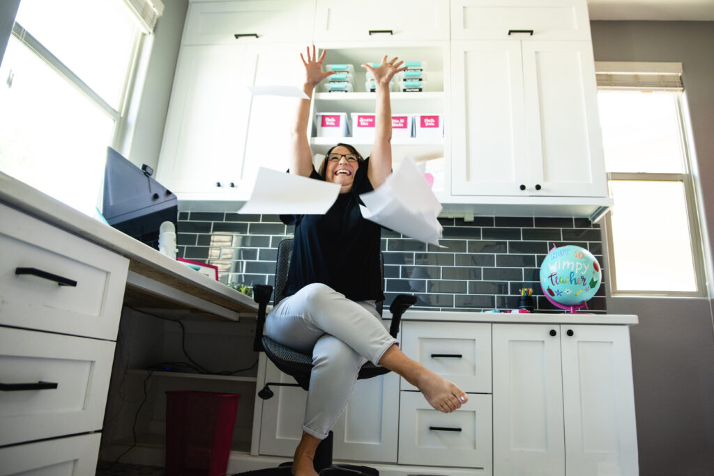 A joyful teacher celebrating