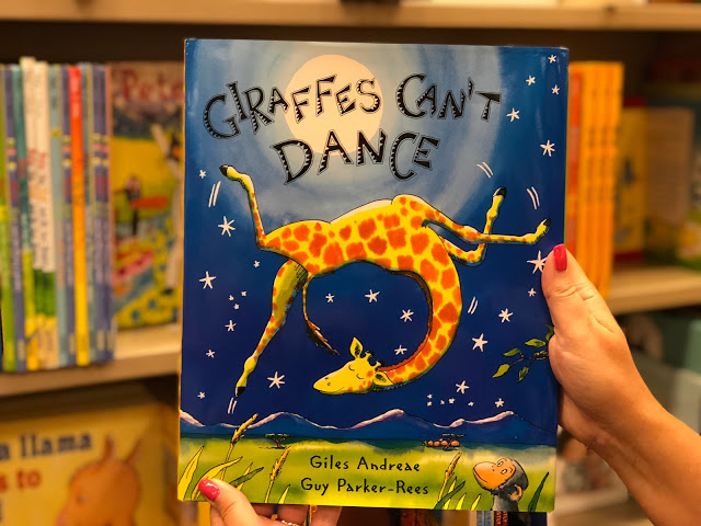 Image of a book called "Giraffes Can't Dance". 