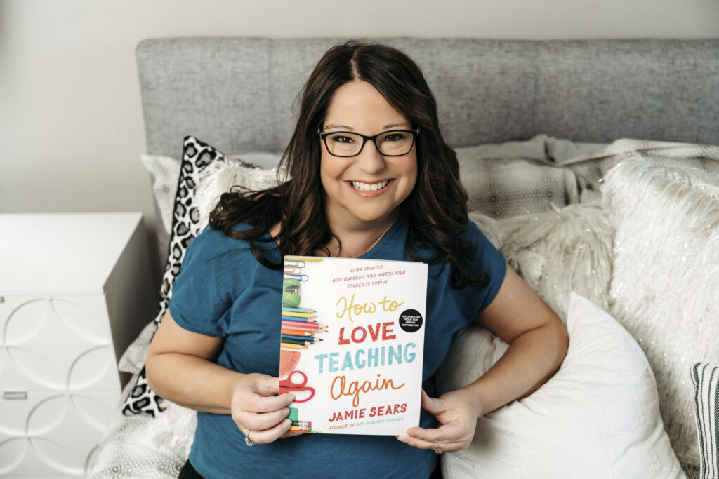 This image shows Jamie Sears holding a copy of her book "How to Love Teaching Again." The book will come out in stores on April 4th, but you can preorder a copy of yours today! 